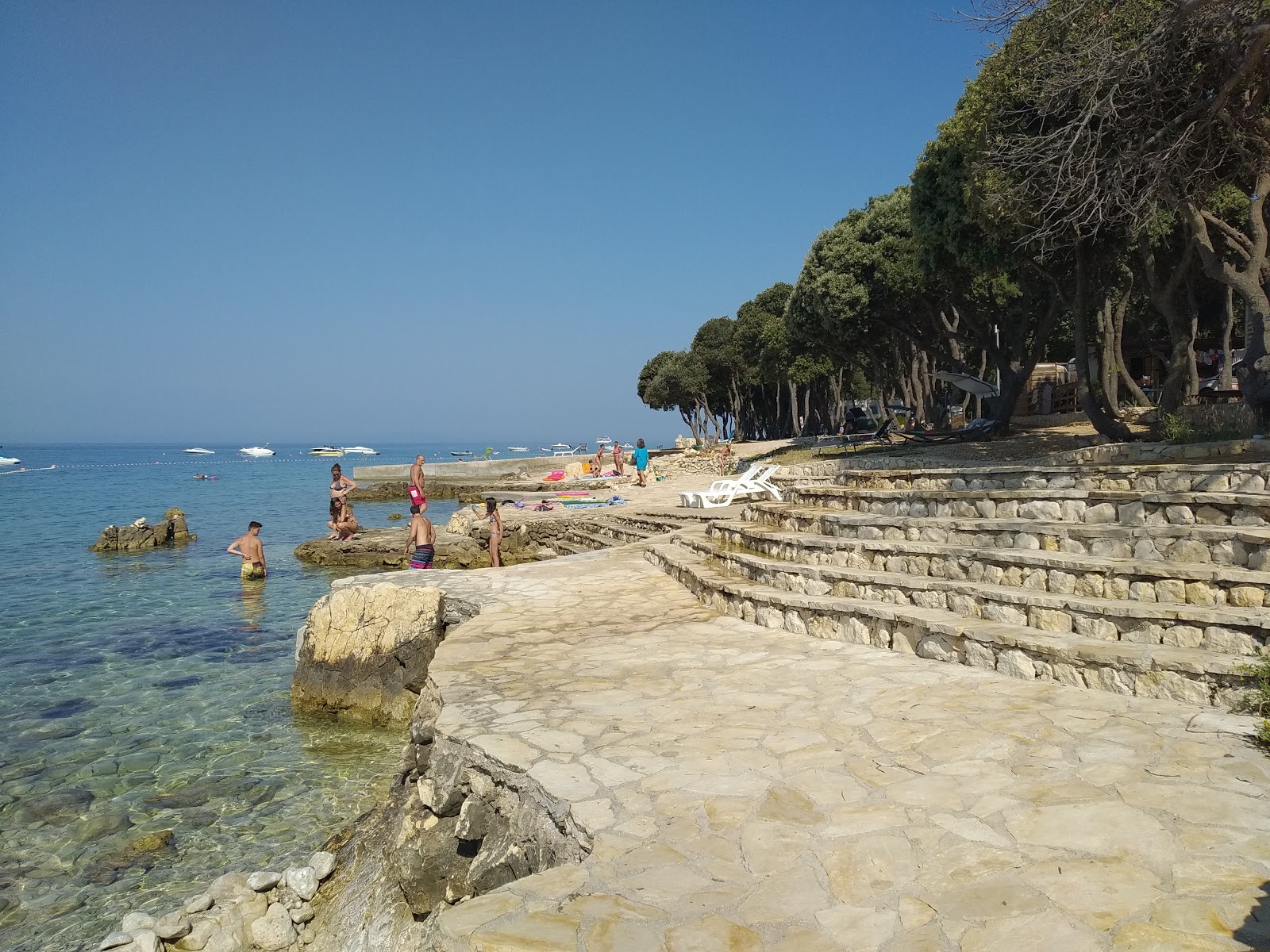 Foto av Scare beach delvis hotellområde