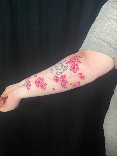 Explore aztec neck tattoo ideas, creative tattoo ideas in Springfield, available at Anchored Ink Tattoo & Piercing by SPLAT LLC