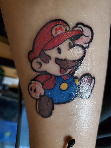 Explore tattoo gap filler ideas, creative tattoo ideas in Fort Lauderdale, available at Rock And Roll Tattoo, Piercing, Laser removal