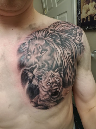 Explore tattoo ideas ribs guys, creative tattoo ideas in Maumelle, available at Lucky Bella Tattoos