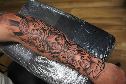 Explore sleeve tattoo ideas family, creative tattoo ideas in Homosassa, available at Citrus Tattoos