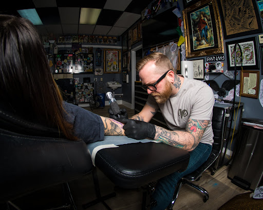 Explore cool arm sleeve tattoo ideas, creative tattoo ideas in Bloomington, available at Artkore Tattoo