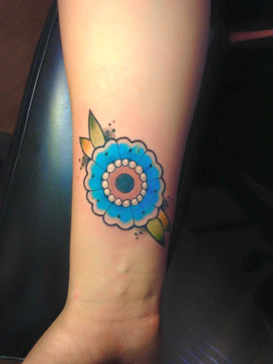 Tattoo Shop «The Shop», reviews and photos, 141 S Grand Ave, Fowlerville, MI 48836, USA