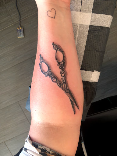 Explore wife name tattoo ideas, creative tattoo ideas in Palm Harbor, available at Angry Owl Tattoo and Piercing