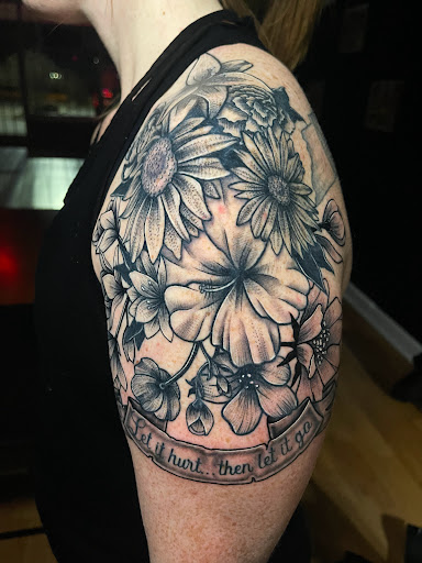 Explore tattoo ideas small flowers, creative tattoo ideas in Madison, available at Golden Phoenix Tattoo Co.