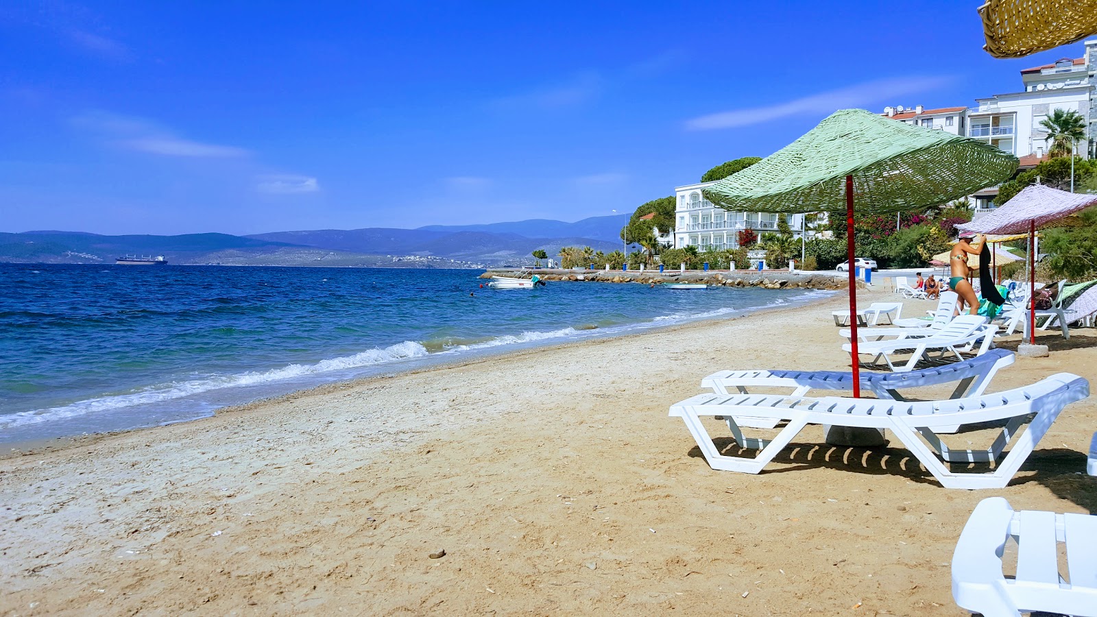 Foto av Monastery Beach med turkos rent vatten yta
