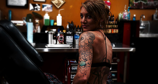 Explore female back tattoo ideas, creative tattoo ideas in Sioux Falls, available at Vishnu Bunny Tattoo and Piercing