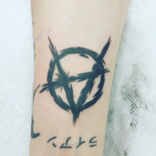 Explore lower back cover up tattoo ideas, creative tattoo ideas in Carbondale, available at MsCandyTattoo