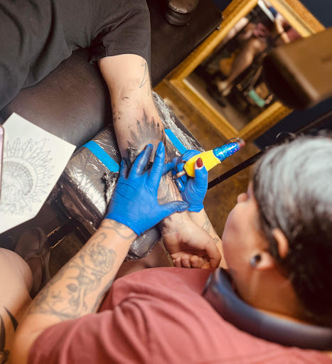 Explore anime couple tattoo ideas, creative tattoo ideas in Bloomington, available at Crimson Breed Tattoo Studio