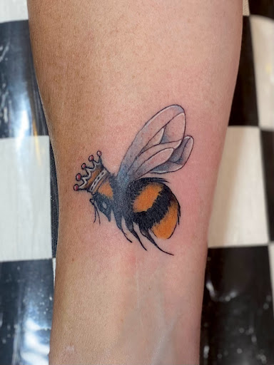 Explore cover up arm tattoo ideas, creative tattoo ideas in Hailey, available at Mountain Rose Tattoo Studio