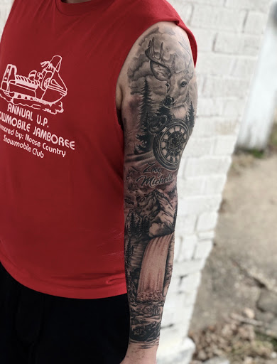 Explore men's face tattoo ideas, creative tattoo ideas in Kingsford, available at Deft Tattoo Studio