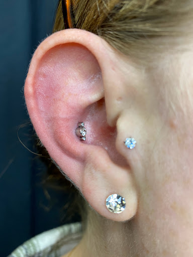 Explore luna moth tattoo ideas, creative tattoo ideas in Orange, available at Symbiosis Body Piercing