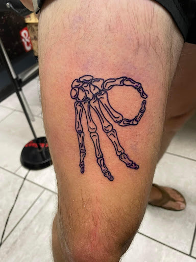 Find angel hand tattoo ideas for your next unique tattoo in Foley at Symbolic Ink Tattoo Studio