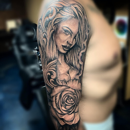 Explore cover up lower back tattoo ideas, creative tattoo ideas in Roanoke, available at Saint Cecilias Art Studio
