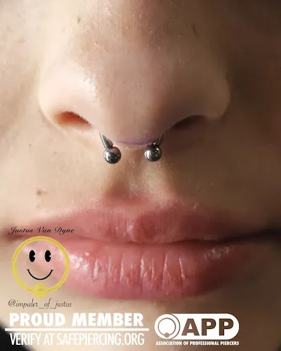 Explore minimalist cat tattoo ideas, creative tattoo ideas in Sumner, available at BLISS Body Piercing and Fine Jewelry