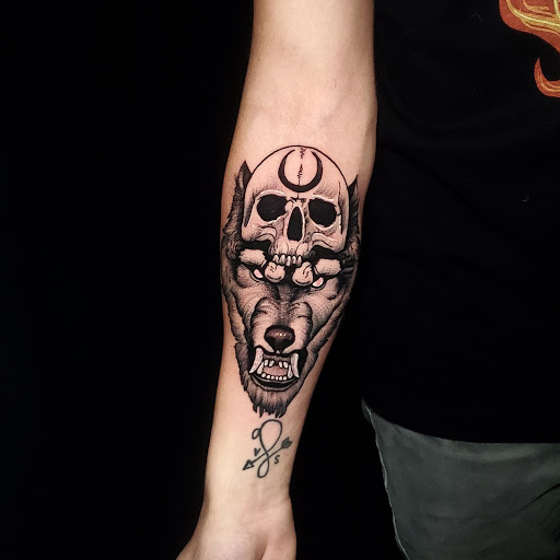 Explore father time tattoo ideas, creative tattoo ideas in Stevens Point, available at International Ink Tattoos