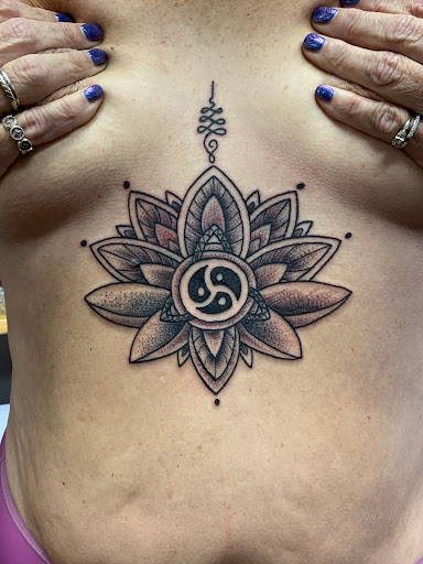 Explore open book tattoo ideas, creative tattoo ideas in Strasburg, available at Champion Tattoo Company