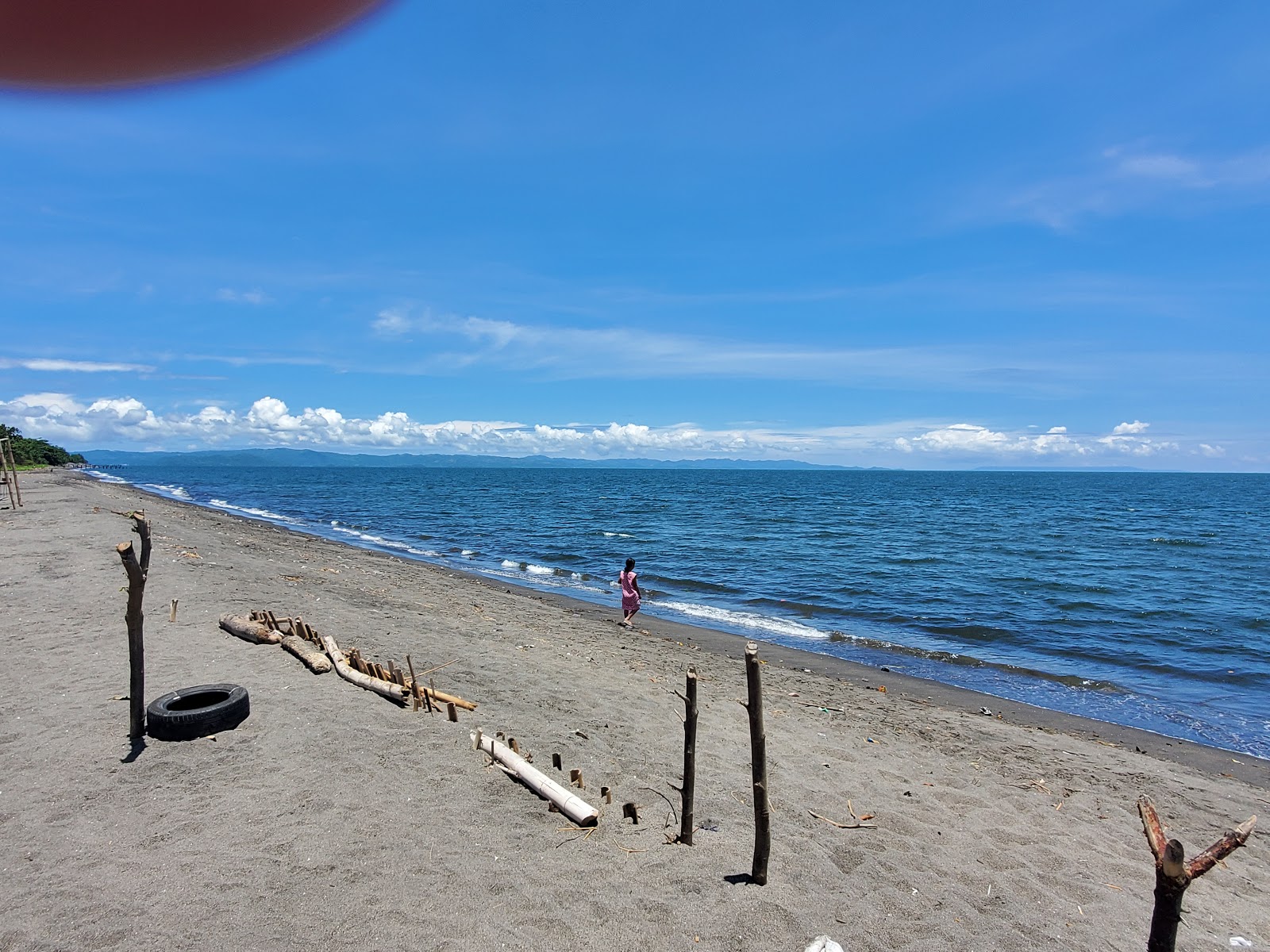 Foto de Batas Senja Beach con agua turquesa superficie