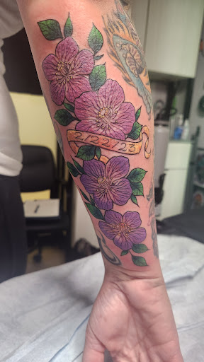 Explore christmas tree tattoo ideas, creative tattoo ideas in Broomfield, available at Ink & Art Collective