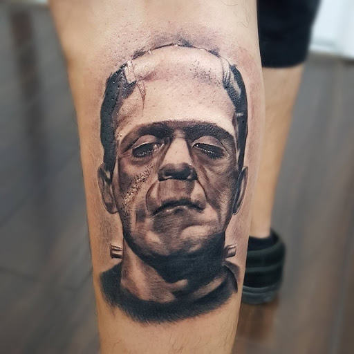 Explore wildlife tattoo ideas, creative tattoo ideas in Peoria, available at Iron Key Tattoo Studio Inc.