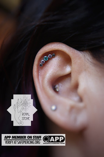 Explore name placement tattoo ideas, creative tattoo ideas in Mobile, available at Royal Stone Piercing