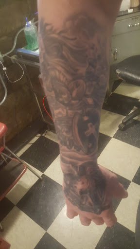 Explore cover up ideas for ankle tattoos, creative tattoo ideas in Asbury, available at Immortal Ink Tattoo