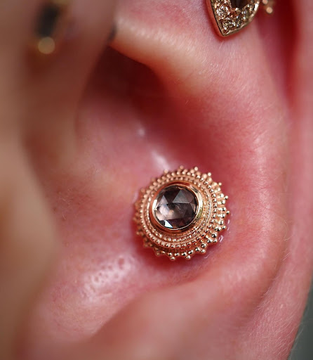 Explore ny giants tattoo ideas, creative tattoo ideas in Seattle, available at Bury Me In Gold Body Piercing