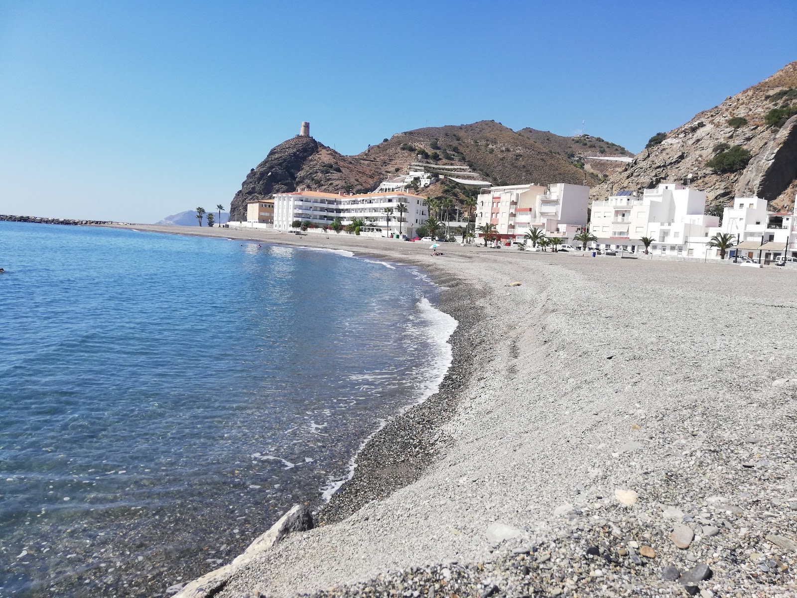 Foto van La MamoLa beach met blauw puur water oppervlakte