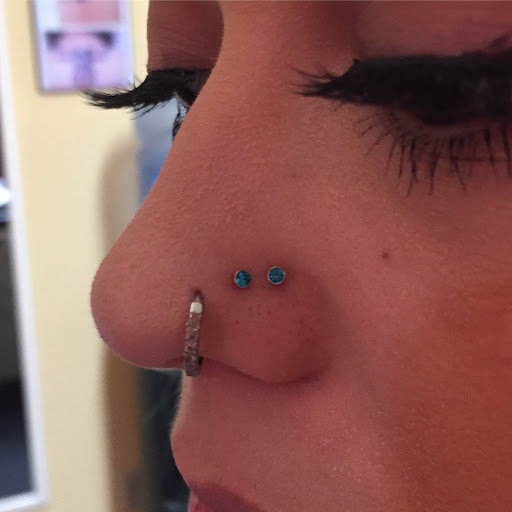 Explore fist tattoo ideas, creative tattoo ideas in San Diego, available at Body Art Salon