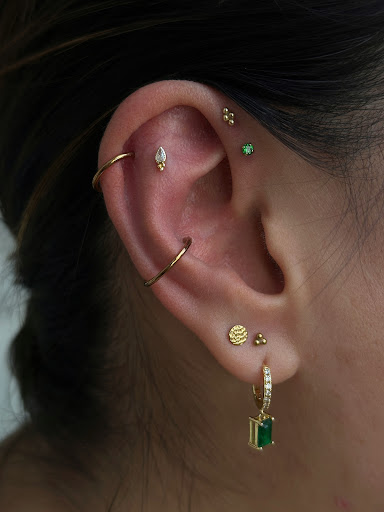 Explore black clover tattoo ideas, creative tattoo ideas in Hampton, available at Luna Estelle Body Piercing Studio