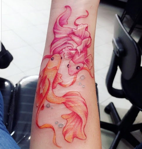 Explore muscle tattoo ideas, creative tattoo ideas in Schaumburg, available at Atmosphere Tattoo Gallery - Schaumburg