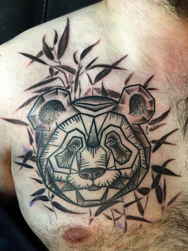 Find dragon tattoo idea for your next unique tattoo in Peoria at Iron Key Tattoo Studio Inc.