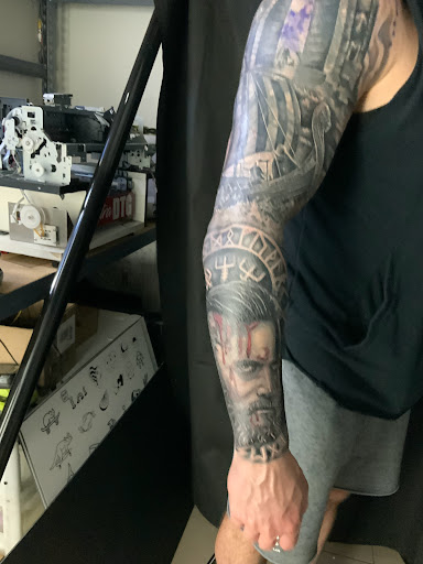 Explore inner bicep tattoo cover up ideas, creative tattoo ideas in Sarasota, available at SEVEN SINS Tattoo Studio