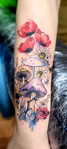 Explore mens sleeve tattoo ideas with meaning, creative tattoo ideas in Benton, available at Spectrum Tattoo