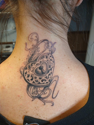 Explore male hand tattoo ideas, creative tattoo ideas in Lexington, available at Tempest Tattoo Studio