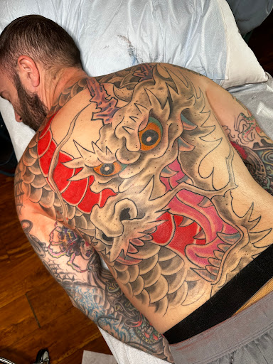 Find tattoo tree ideas for your next unique tattoo in Boulder at Strange Magic Tattoo