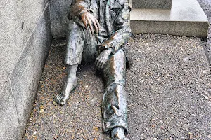 “The Homeless” - street art statue. image