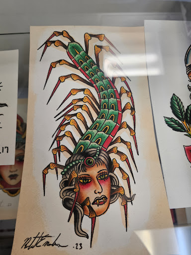 Explore 3 percent tattoo ideas, creative tattoo ideas in Media, available at Baker Street Tattoo