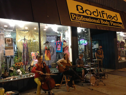 Explore dog bone tattoo ideas, creative tattoo ideas in Oswego, available at Bodified