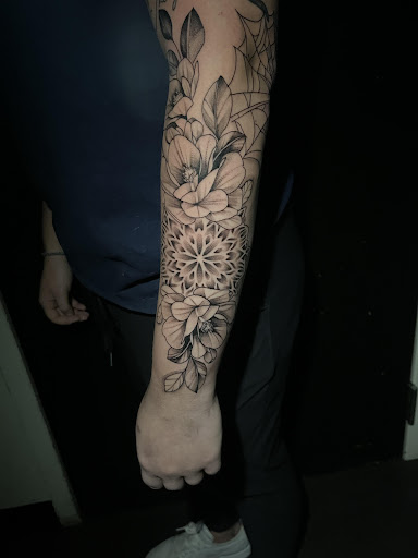Explore men's shin tattoo ideas, creative tattoo ideas in Columbia, available at Black Widow Tattoo