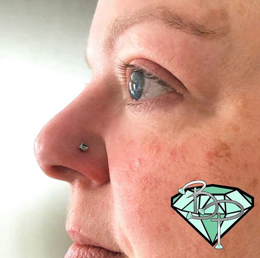 Explore sign language tattoo ideas, creative tattoo ideas in Columbus, available at Bella Piercings, LLC.