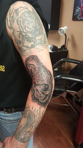 Explore atlantis tattoo ideas, creative tattoo ideas in Westland, available at Premier Tattoo Company Westland