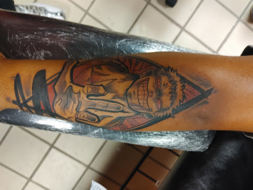 Explore fire tattoos ideas, creative tattoo ideas in Hereford, available at Slow Pain Tattoo Body Art Studio