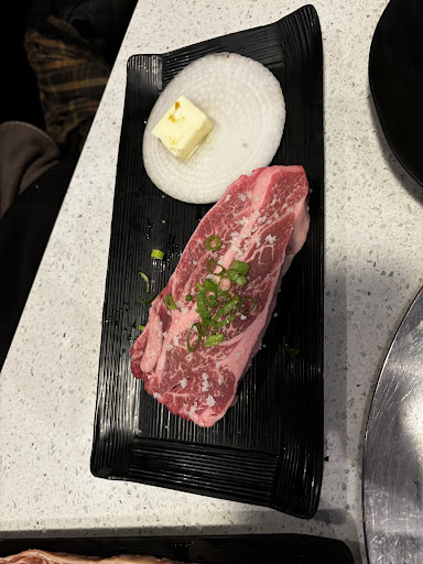 Sirloin steak with butter and onion 