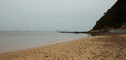 Foto van Duegi Beach met een ruime kustlijn