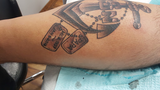 Explore memorial dog tattoo ideas, creative tattoo ideas in Chicago Heights, available at State Line Tattoo Company