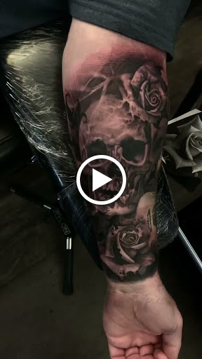 Explore color flower tattoo ideas, creative tattoo ideas in Clinton, available at Black Relic Tattoo