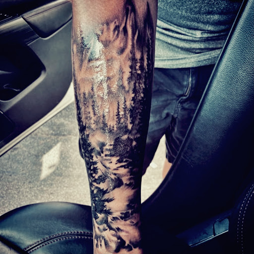Explore man tattoo sleeve ideas, creative tattoo ideas in Peoria, available at InkCapital Tattoos