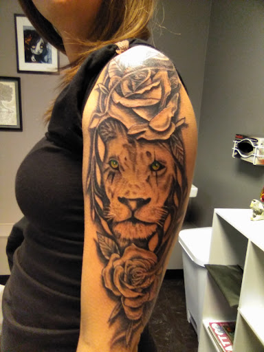 Explore boxer tattoo ideas, creative tattoo ideas in Coldwater, available at Relevant Tattoo and Piercing