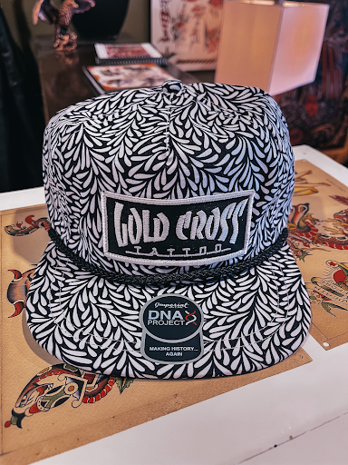 Explore dog love tattoo ideas, creative tattoo ideas in Johnson City, available at Gold Cross Tattoo Co.